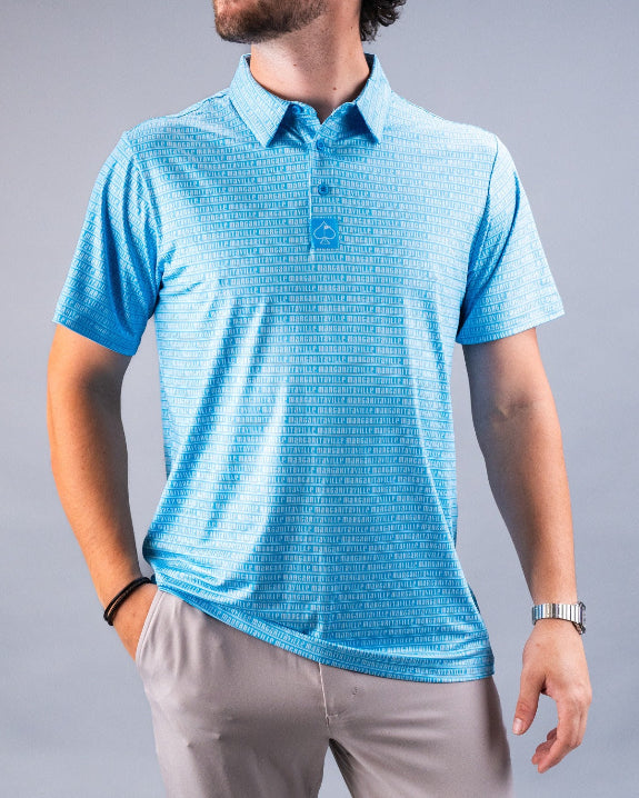 Men’s Margaritaville Rendezvous performance golf polo by Pins & Aces featuring a bright blue all-over pattern, short sleeves, collared neckline, and athletic fit.