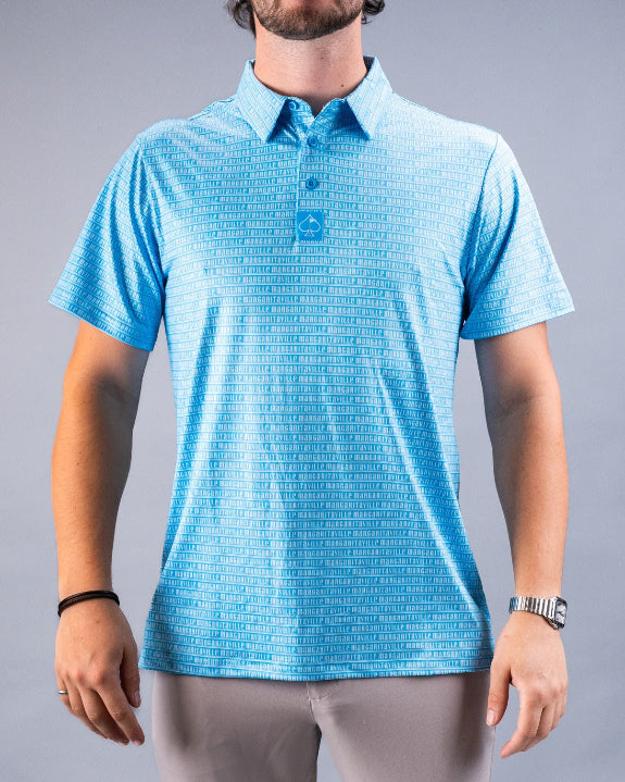 Men’s Margaritaville Rendezvous performance golf polo by Pins & Aces featuring a bright blue all-over pattern, short sleeves, collared neckline, and athletic fit.