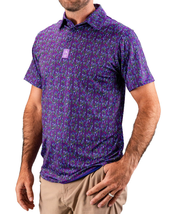Men’s Doodle Guy Purple golf polo by Pins & Aces featuring an all-over purple, violet, blue, and green doodle-inspired pattern with short sleeves and an athletic performance fit.