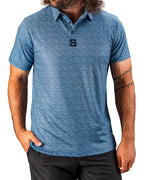 Men’s Squiggle Blue performance golf polo by Pins & Aces featuring a subtle textured blue pattern, short sleeves, and athletic fit.