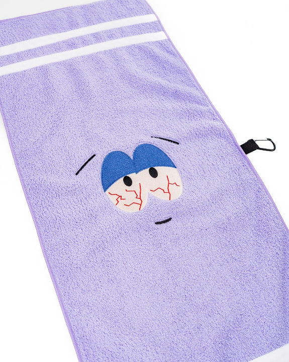 South Park Towelie premium microfiber golf towel from the official Pins & Aces x South Park collection, designed as a lightweight and absorbent golf accessory.