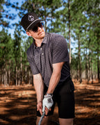 Men’s Slate Mosaic Player Preferred golf polo by Pins & Aces featuring a slate gray geometric pattern, modern blade collar, short sleeves, and athletic performance fit.
