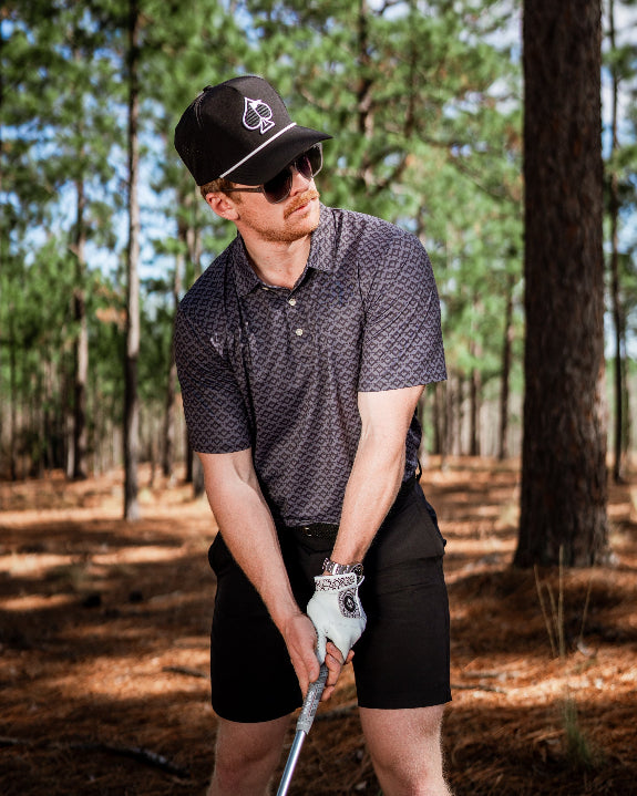 Men’s Slate Mosaic Player Preferred golf polo by Pins & Aces featuring a slate gray geometric pattern, modern blade collar, short sleeves, and athletic performance fit.