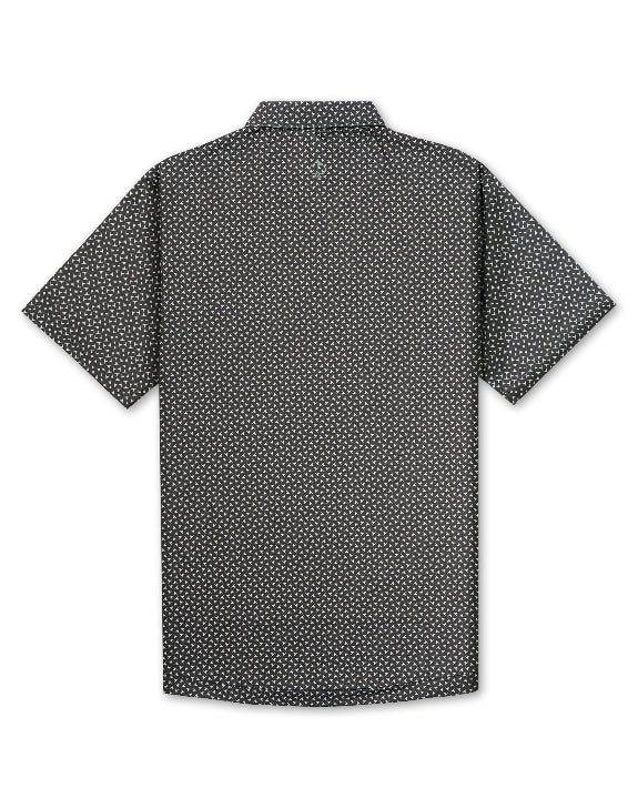 Men’s Jade Drops golf polo by Pins & Aces featuring a dark jade green geometric pattern, modern blade collar, short sleeves, and athletic performance fit.