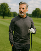 Men’s Player Preferred™ Slate Grey performance golf crewneck by Pins & Aces featuring a classic crew neckline, long sleeves, elastic cuffs and waist, and a tailored course-to-clubhouse fit.