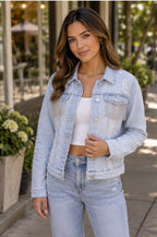 Audrey is wearing Distressed Jean Jacket with Rhinestone Fringe for Women | Stretch Denim Statement Jacket
