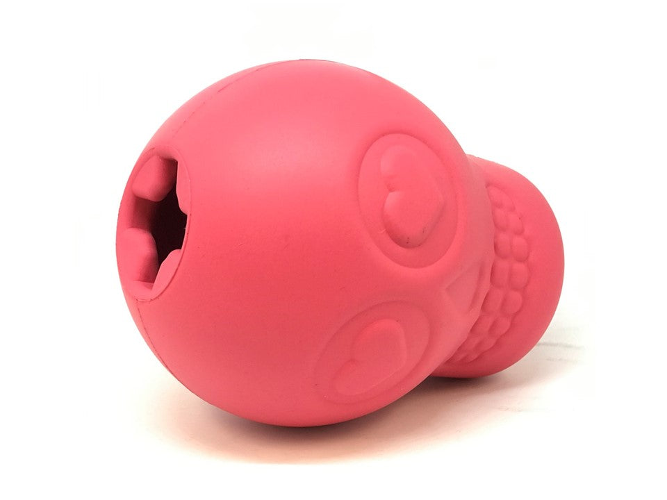 Pink SodaPup Sugar Skull dog chew toy and treat dispenser made in the USA from FDA-compliant natural rubber for dogs approximately 30 to 65 pounds.
