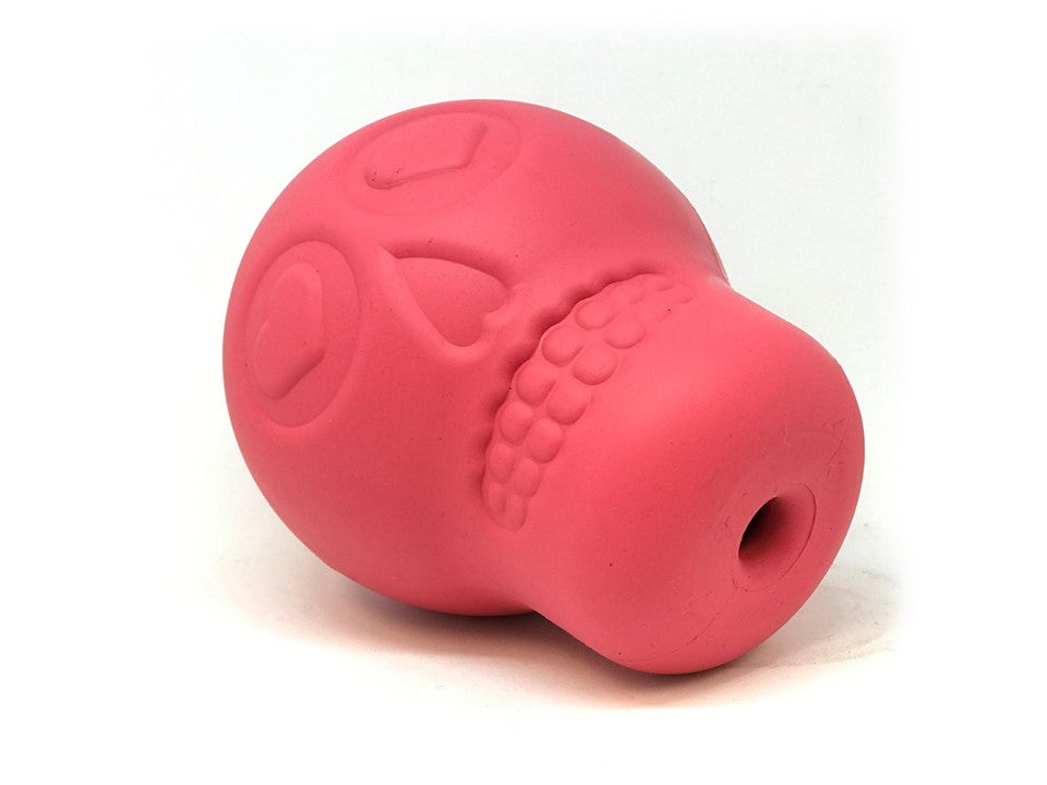 Pink SodaPup Sugar Skull dog chew toy and treat dispenser made in the USA from FDA-compliant natural rubber for dogs approximately 30 to 65 pounds.