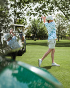 Men’s Frost Burn blue performance golf polo by Pins & Aces featuring a cool-toned design, short sleeves, collared neckline, and athletic fit.
