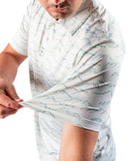 Men’s Altitude Adjustment golf polo by Pins & Aces featuring an off-white base with a subtle blue-green mountain range print, short sleeves, and athletic performance fit.