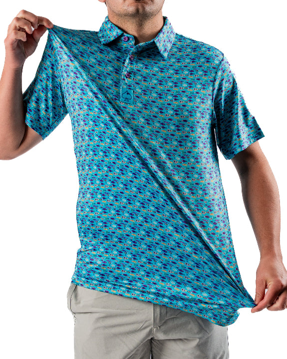 Men’s Fish & Drips golf polo by Pins & Aces featuring a bright aqua blue all-over fish print with colorful fishing-inspired details, short sleeves, and an athletic performance fit.
