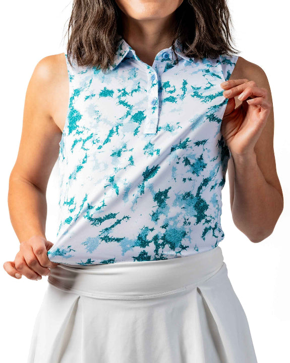 Pins & Aces Women’s Frost Burn performance golf polo featuring an athletic fit with breathable fast-wicking fabric, SPF 45+ sun protection and built-in sunglasses holder.