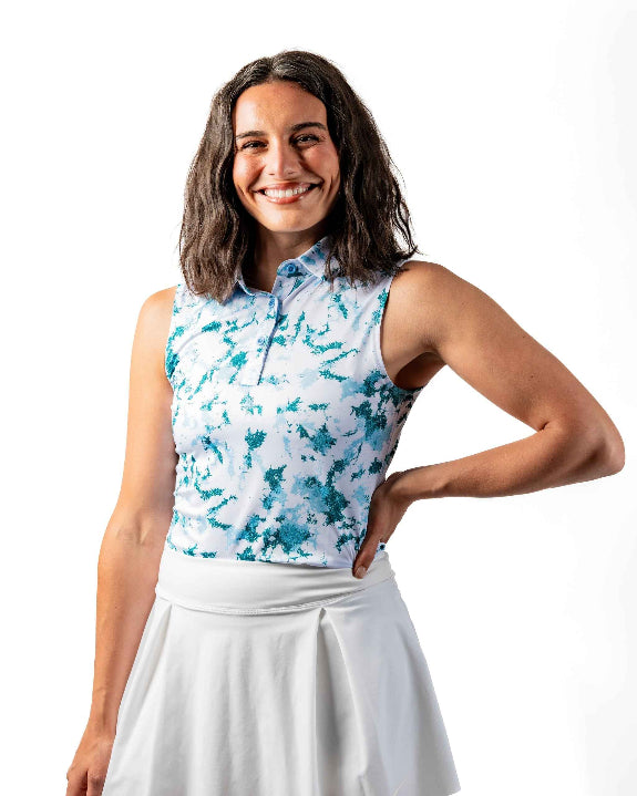 Pins & Aces Women’s Frost Burn performance golf polo featuring an athletic fit with breathable fast-wicking fabric, SPF 45+ sun protection and built-in sunglasses holder.
