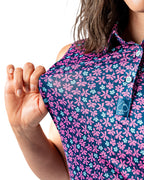 Pins & Aces Women’s Full Bloom performance golf polo featuring a floral-inspired design, women’s athletic fit, fast-wicking fabric and SPF 45+ sun protection.