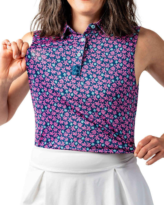 Pins & Aces Women’s Full Bloom performance golf polo featuring a floral-inspired design, women’s athletic fit, fast-wicking fabric and SPF 45+ sun protection.