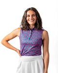 Pins & Aces Women’s Full Bloom performance golf polo featuring a floral-inspired design, women’s athletic fit, fast-wicking fabric and SPF 45+ sun protection.