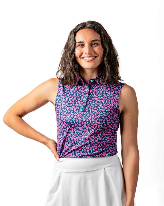 Pins & Aces Women’s Full Bloom performance golf polo featuring a floral-inspired design, women’s athletic fit, fast-wicking fabric and SPF 45+ sun protection.