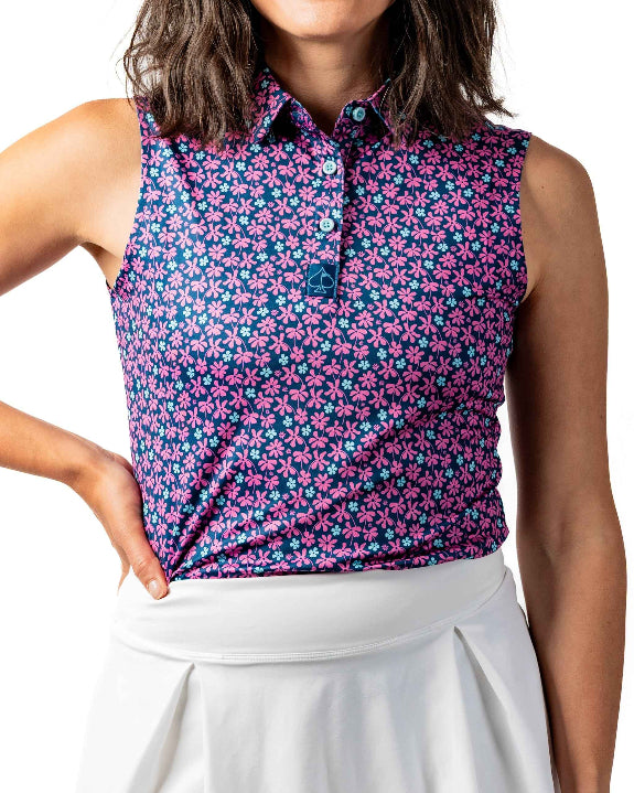 Pins & Aces Women’s Full Bloom performance golf polo featuring a floral-inspired design, women’s athletic fit, fast-wicking fabric and SPF 45+ sun protection.