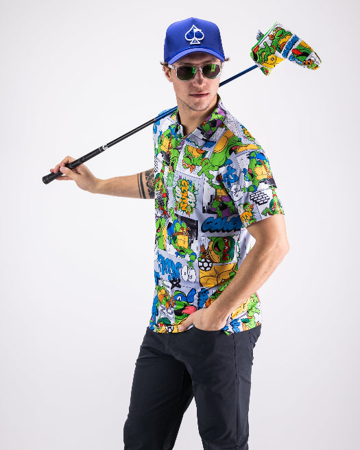 Men’s TMNT Comic Strip golf polo by Pins & Aces featuring colorful Teenage Mutant Ninja Turtles comic artwork in an all-over print.
