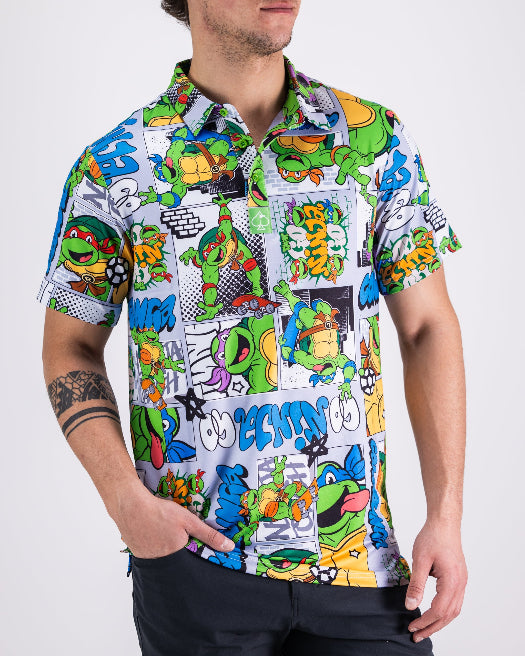 Men’s TMNT Comic Strip golf polo by Pins & Aces featuring colorful Teenage Mutant Ninja Turtles comic artwork in an all-over print.