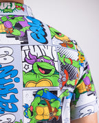 Men’s TMNT Comic Strip golf polo by Pins & Aces featuring colorful Teenage Mutant Ninja Turtles comic artwork in an all-over print.
