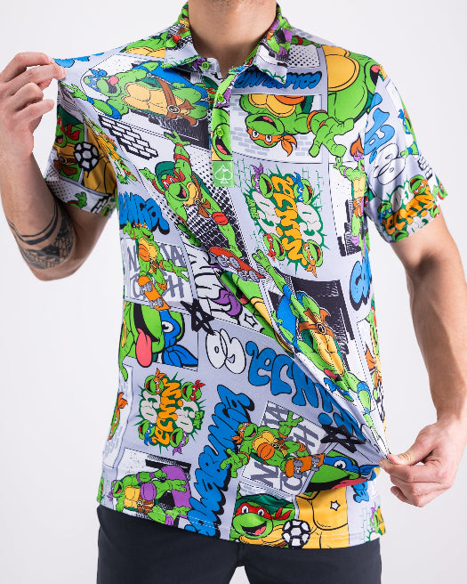 Men’s TMNT Comic Strip golf polo by Pins & Aces featuring colorful Teenage Mutant Ninja Turtles comic artwork in an all-over print.