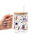 Ghosts and Books drinkware design featuring cute white ghosts reading and carrying colorful books surrounded by black bats and pink, purple and orange stars.