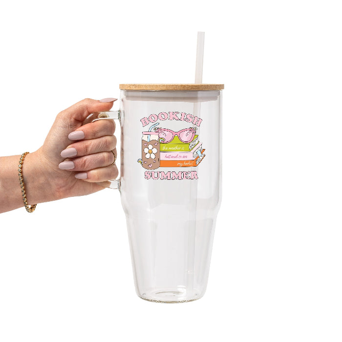 Retro Bookish Summer design featuring stacked books, pink sunglasses, a floral iced drink and the phrase “The weather is hot and so are my books.”