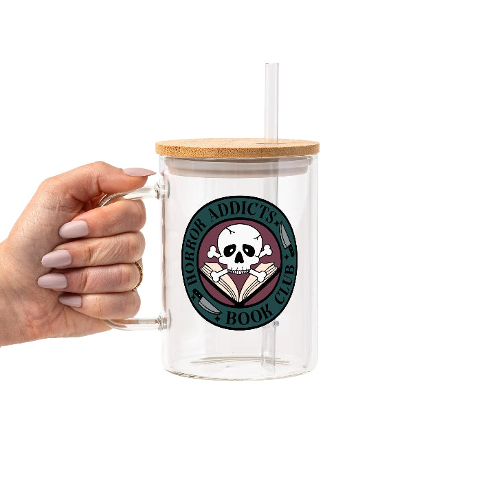 Horror Addicts Book Club design featuring a white skull and crossbones over an open book with knife illustrations, gothic black lettering, and a deep teal and burgundy circular background.