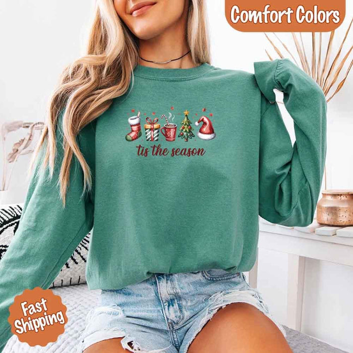’Tis The Season Comfort Colors long sleeve Christmas shirt featuring a festive holiday graphic on a soft garment-dyed 100% cotton tee in Island Reef