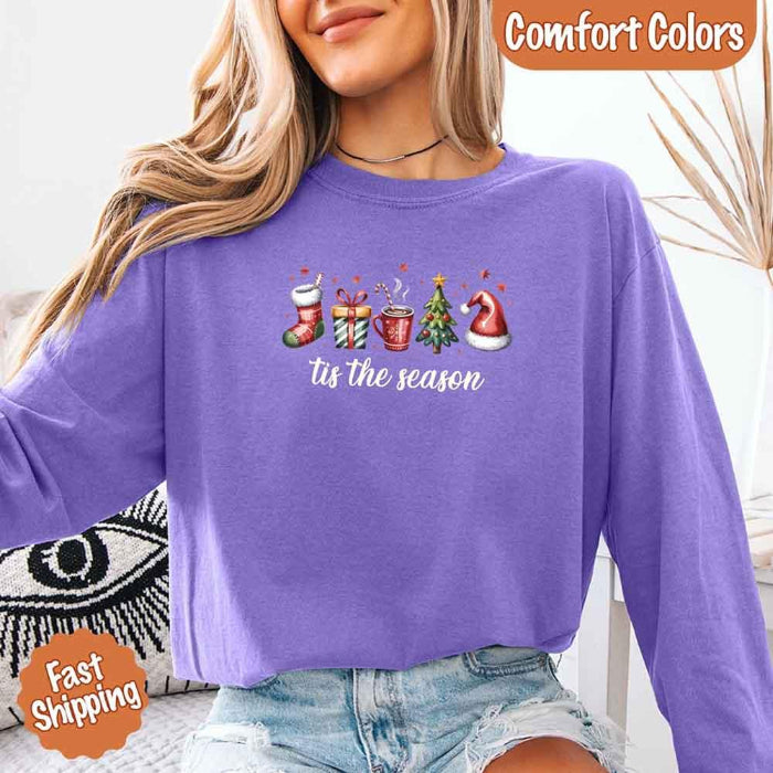 ’Tis The Season Comfort Colors long sleeve Christmas shirt featuring a festive holiday graphic on a soft garment-dyed 100% cotton tee in Black
