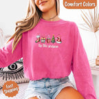 ’Tis The Season Comfort Colors long sleeve Christmas shirt featuring a festive holiday graphic on a soft garment-dyed 100% cotton tee in Crunchberry