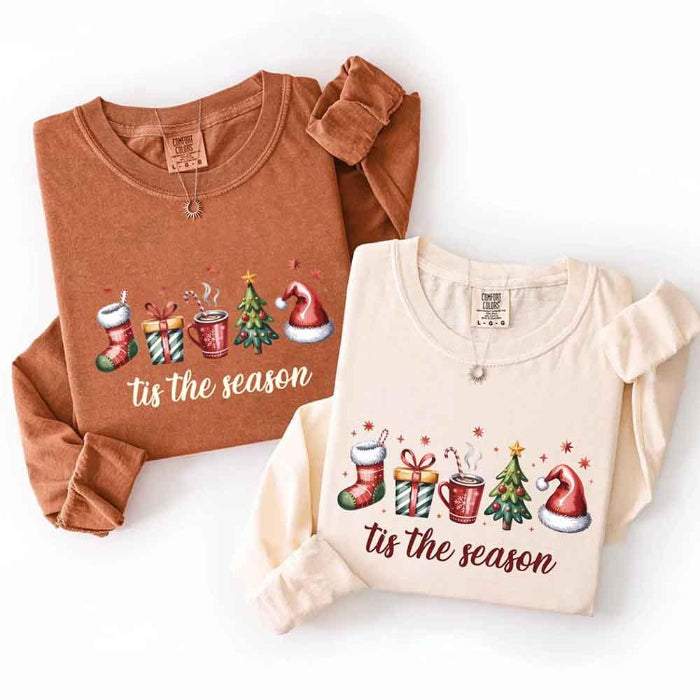 ’Tis The Season Comfort Colors long sleeve Christmas shirt featuring a festive holiday graphic on a soft garment-dyed 100% cotton tee in Ivory and Yam