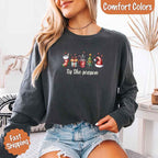 ’Tis The Season Comfort Colors long sleeve Christmas shirt featuring a festive holiday graphic on a soft garment-dyed 100% cotton tee in Pepper