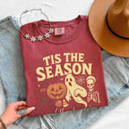 ’Tis The Season Halloween Comfort Colors T-shirt featuring a festive spooky-season graphic on a relaxed garment-dyed cotton tee in Crimson