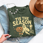 ’Tis The Season Halloween Comfort Colors T-shirt featuring a festive spooky-season graphic on a relaxed garment-dyed cotton tee in Moss