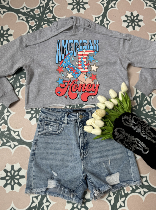 American Honey Graphic Tee printed on premium Comfort Colors 100% cotton featuring an exclusive Willow Boutique western-inspired design, perfect for country concerts, Nashville trips, rodeos, and everyday country style. Cropped Hoodie in Grey