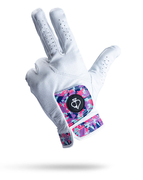 White Pins & Aces Vivid Camo Premium Tour golf glove made from Cabretta leather with perforated fingers and a colorful pink, aqua, purple, and navy camo wrist design.