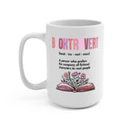 Clear glass cup with bamboo lid and straw featuring pink Booktrovert lettering, a definition about preferring fictional characters to real people, and an open book filled with pink and purple flowers.
