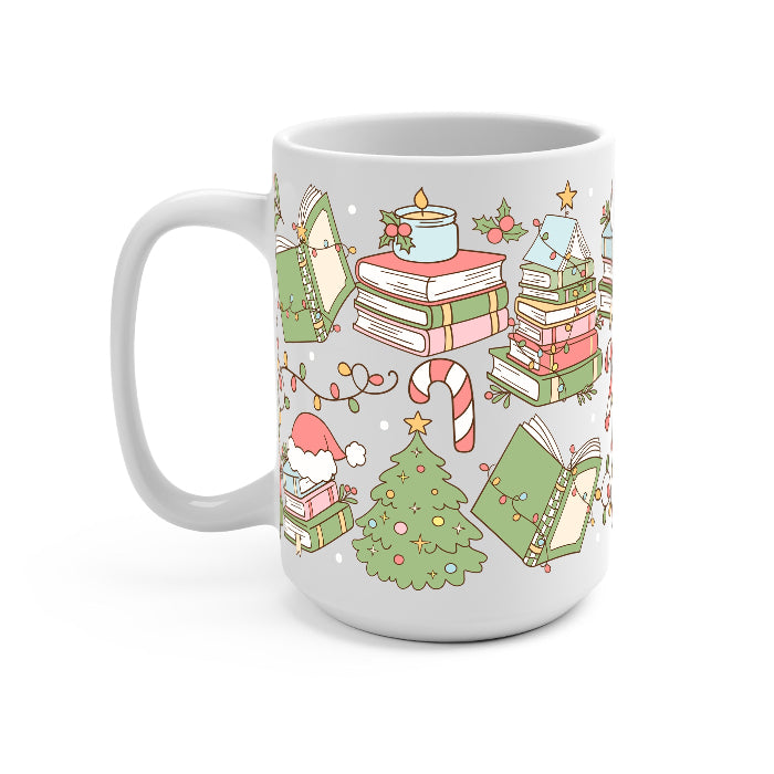Clear glass cup with bamboo lid and straw featuring a festive wraparound design of stacked books, decorated Christmas trees, candy canes, candles, holly and colorful holiday accents.