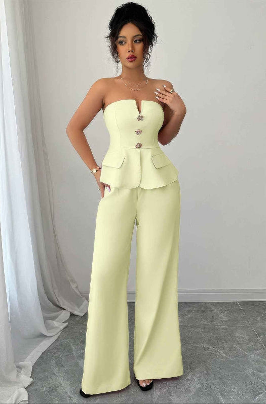 Women’s off-the-shoulder two-piece matching set featuring a cinched waist top and flowing wide-leg pants in a lightweight stretch fabric.