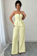 Women’s off-the-shoulder two-piece matching set featuring a cinched waist top and flowing wide-leg pants in a lightweight stretch fabric.