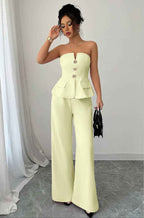 Women’s off-the-shoulder two-piece matching set featuring a cinched waist top and flowing wide-leg pants in a lightweight stretch fabric.