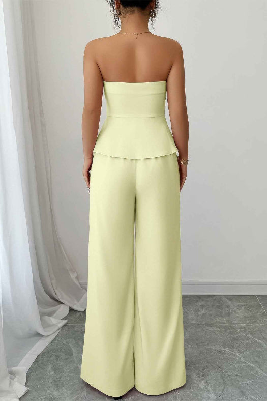 Women’s off-the-shoulder two-piece matching set featuring a cinched waist top and flowing wide-leg pants in a lightweight stretch fabric.