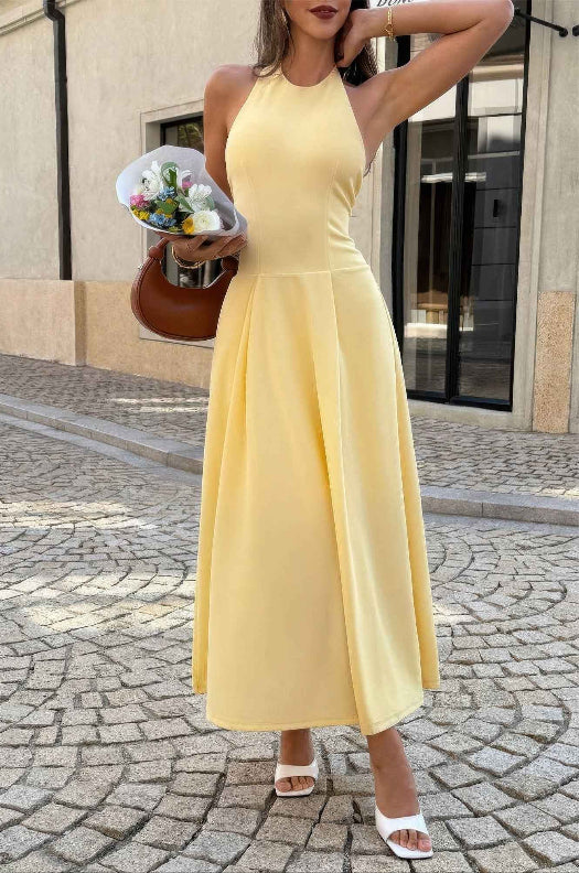 Women’s solid halter midi dress featuring a sleeveless neckline, graceful dropped hem, lightweight stretch fabric, and flowing feminine silhouette.