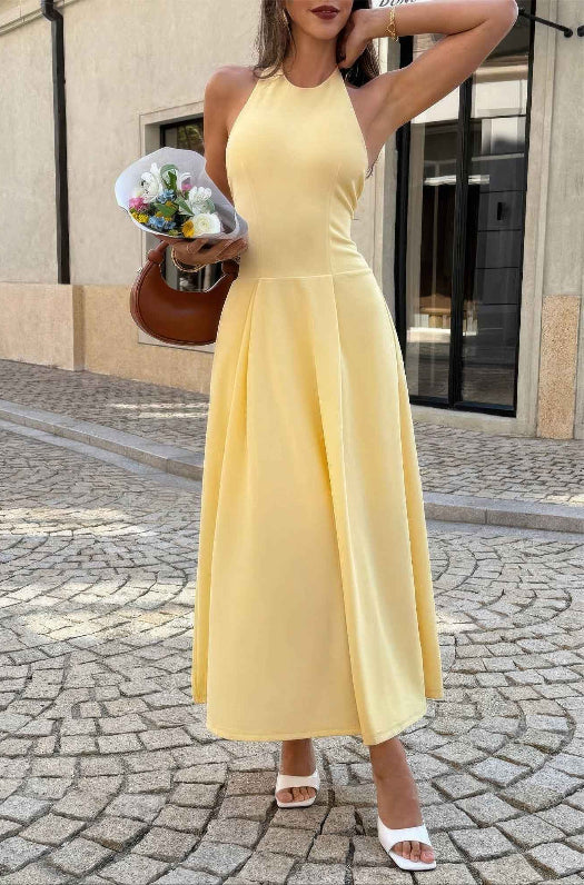 Women’s solid halter midi dress featuring a sleeveless neckline, graceful dropped hem, lightweight stretch fabric, and flowing feminine silhouette.