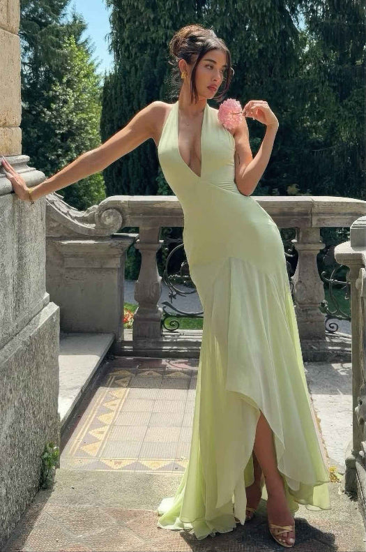 Women’s solid halter tulle maxi dress featuring a plunging deep V-neckline, open back, flowing layered tulle skirt, and elegant formal silhouette.