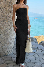 Women’s solid off-the-shoulder lace maxi dress featuring a fitted bodycon silhouette, romantic lace detailing, soft stretch fabric, and an elegant floor-length design in Black.