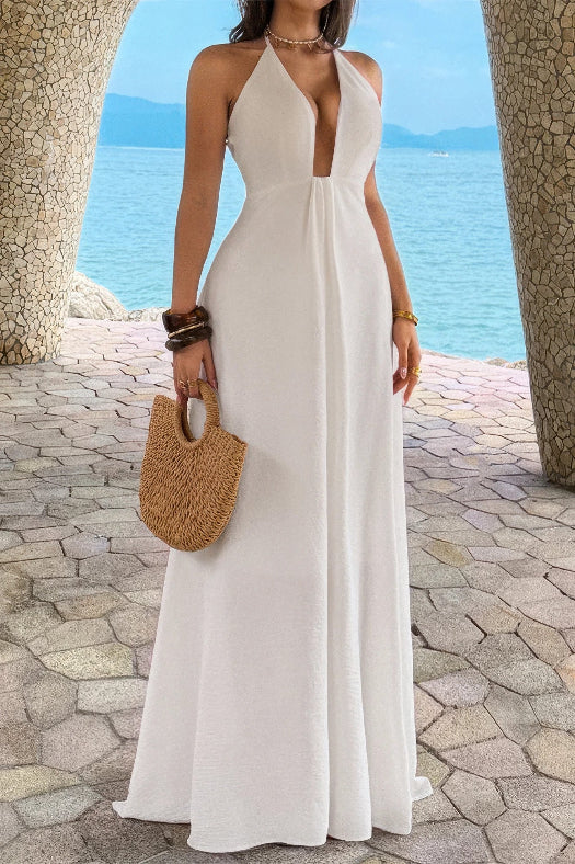 Women’s solid halter maxi dress featuring an elegant neckline, hidden back zipper, flowing A-line skirt, and sophisticated full-length silhouette.