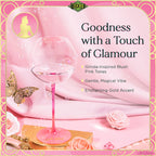 Pink glass with gold accents on a pink background, featuring text about 'Goodness with a Touch of Glamour'.